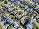 Aerial view of a residential neighborhood with various house styles at 2009 Claudio Ln, The Villages, FL 32159