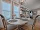 Bright dining room featuring a round marble table and chairs at 2009 Claudio Ln, The Villages, FL 32159