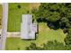 Bird's-eye view of house showing the layout and yard at 2010 Hollywood Dr, Leesburg, FL 34748