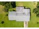 Bird's eye view of a house with a yard at 2010 Hollywood Dr, Leesburg, FL 34748