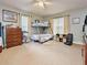 Bedroom featuring a bunk bed and dresser at 204 Lori Ct, Umatilla, FL 32784