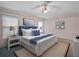 Comfortable bedroom with a large bed, soft lighting, and stylish accents at 21122 Lionheart Dr, Leesburg, FL 34748