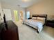 Spacious bedroom with king-size bed and en-suite bathroom at 2185 Victoria Dr, Davenport, FL 33837