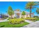 Community clubhouse with columns and landscaping at 2185 Victoria Dr, Davenport, FL 33837