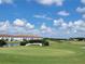 Community view of a pond and golf course at 2185 Victoria Dr, Davenport, FL 33837