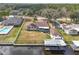 Aerial view of house, large backyard, boat dock, and canal at 28228 Tammi Dr, Tavares, FL 32778