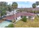 Aerial view of single-story home with carport and large backyard at 28228 Tammi Dr, Tavares, FL 32778