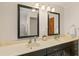 Double vanity bathroom with large mirrors at 28228 Tammi Dr, Tavares, FL 32778