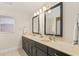 Double vanity bathroom with large mirrors at 28228 Tammi Dr, Tavares, FL 32778