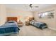 Bedroom with two twin beds and window at 28228 Tammi Dr, Tavares, FL 32778