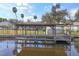 Long wooden boat dock and covered area at 28228 Tammi Dr, Tavares, FL 32778