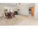 Game room with poker table and view into adjacent living room at 28228 Tammi Dr, Tavares, FL 32778