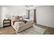 Main bedroom with king-size bed and neutral decor at 3257 Kilarny Pl, The Villages, FL 32163