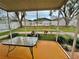 Enjoy the view from this screened patio overlooking the backyard at 33304 Kaylee Way, Leesburg, FL 34788