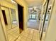 Large walk-in closet with custom shelving and mirrored doors at 33304 Kaylee Way, Leesburg, FL 34788