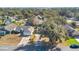 Aerial view of house and neighborhood, showing surrounding homes at 33352 Fountain Ln, Leesburg, FL 34788