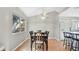 Bright dining room featuring a table with six chairs and large window at 33352 Fountain Ln, Leesburg, FL 34788