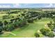 Aerial view of community near golf course at 3570 Rollingbrook St, Clermont, FL 34711