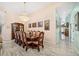 Formal dining room with large table and seating for many at 365 N Spaulding Cv, Lake Mary, FL 32746