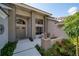 Inviting front entrance with landscaping and a fire pit at 365 N Spaulding Cv, Lake Mary, FL 32746