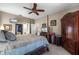 Spacious bedroom with a large bed and plenty of closet space at 3898 Beacon Ridge Way, Clermont, FL 34711