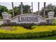 Entrance to Legends Golf & Country Club, featuring a stone sign at 3898 Beacon Ridge Way, Clermont, FL 34711