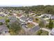 Aerial view of house and neighborhood at 392 Arbella Loop, The Villages, FL 32162