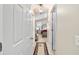 Hallway with view of bedroom and access to other rooms at 392 Arbella Loop, The Villages, FL 32162