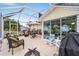 Enjoy this large screened patio with plenty of seating at 392 Arbella Loop, The Villages, FL 32162