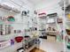 Walk-in pantry features metal shelving for maximum storage and organization at 39656 Harbor Hills Blvd, Lady Lake, FL 32159