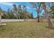 Large backyard with wooden privacy fence at 40210 Orange Cir, Lady Lake, FL 32159