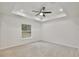 Bright bedroom with a window offering natural light and ceiling fan at 40210 Orange Cir, Lady Lake, FL 32159