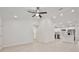 Bright and airy living room with high ceilings and tile flooring at 40210 Orange Cir, Lady Lake, FL 32159