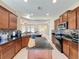 Modern kitchen with breakfast bar and island at 409 Silver Maple Rd, Groveland, FL 34736