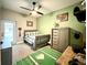 Spacious bedroom with a baseball-themed rug and plenty of closet space at 41913 Cassia St, Eustis, FL 32736