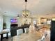 Bright dining room with hardwood floors and chandelier at 41913 Cassia St, Eustis, FL 32736