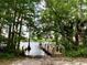 Wooden dock extending over calm lake water at 41913 Cassia St, Eustis, FL 32736