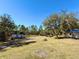 Large backyard with camper and trailer at 41913 Cassia St, Eustis, FL 32736