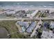 Aerial view of coastal community with pool, parking and ocean access at 4870 S. Atlantic Ave, # 2040, New Smyrna Beach, FL 32169