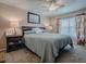 Serene bedroom with a queen-size bed and window coverings at 4870 S. Atlantic Ave, # 2040, New Smyrna Beach, FL 32169