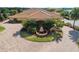 Luxury home with circular driveway and fountain at 4992 Big Cypress St, Oxford, FL 34484