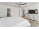 Main bedroom with a king bed, and lots of natural light at 4992 Big Cypress St, Oxford, FL 34484