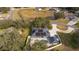 Property overview with pool and detached structure at 5055 County Road 125 # B1, Wildwood, FL 34785