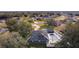 Aerial view of house, pool, and surrounding area at 5055 County Road 125 # B1, Wildwood, FL 34785