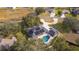 Property overview showcasing the house, pool, and landscape at 5055 County Road 125 # B1, Wildwood, FL 34785