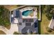 Overhead view of house, pool, and driveway at 5055 County Road 125 # B1, Wildwood, FL 34785