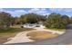 House with a circular driveway and large backyard at 5055 County Road 125 # B1, Wildwood, FL 34785