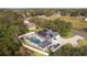 Aerial view of house with pool and large lot at 5055 County Road 125 # B1, Wildwood, FL 34785