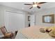 Spacious bedroom with large closet and ceiling fan at 5055 County Road 125 # B1, Wildwood, FL 34785