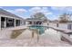 Resort-style pool and spa with a covered patio at 5055 County Road 125 # B1, Wildwood, FL 34785